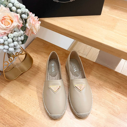 PRADA 26S LOGO ESPADRILLE SLIP ON FLATS IN DARK BEIGE CALFSKIN