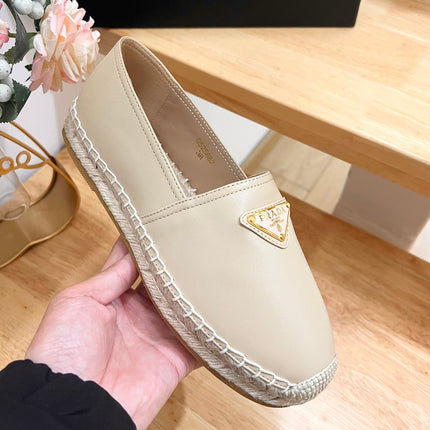 PRADA 26S LOGO ESPADRILLE SLIP ON FLATS IN DARK BEIGE CALFSKIN