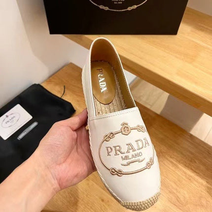 PRADA 26S EMBROIDERED LOGO ESPADRILLE FLATS IN WHITE CALFSKIN