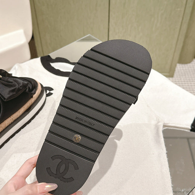 CC SLIPPERS WITH SILK BOW IN BLACK COWHIDE