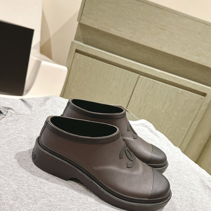 CC RAIN BOOTS IN BROWN AND BLACK TPU