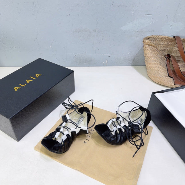 ALAIA 26S LACE-UP BALLET FLATS IN BLACK LAMBSKIN AND SUEDE