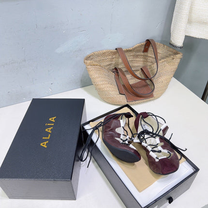 ALAIA 26S LACE-UP BALLET FLATS IN MERLOT RED LAMBSKIN AND SUEDE