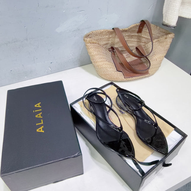 ALAIA 26S THONG SANDALS IN BLACK CALFSKIN