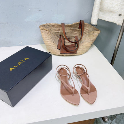 ALAIA 26S THONG SANDALS IN NUDE CALFSKIN