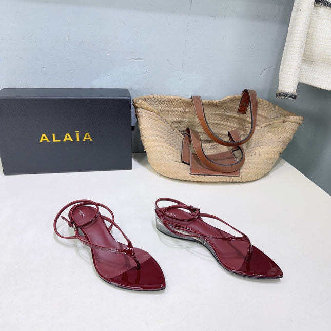 ALAIA 26S THONG SANDALS IN DARK RED CALFSKIN