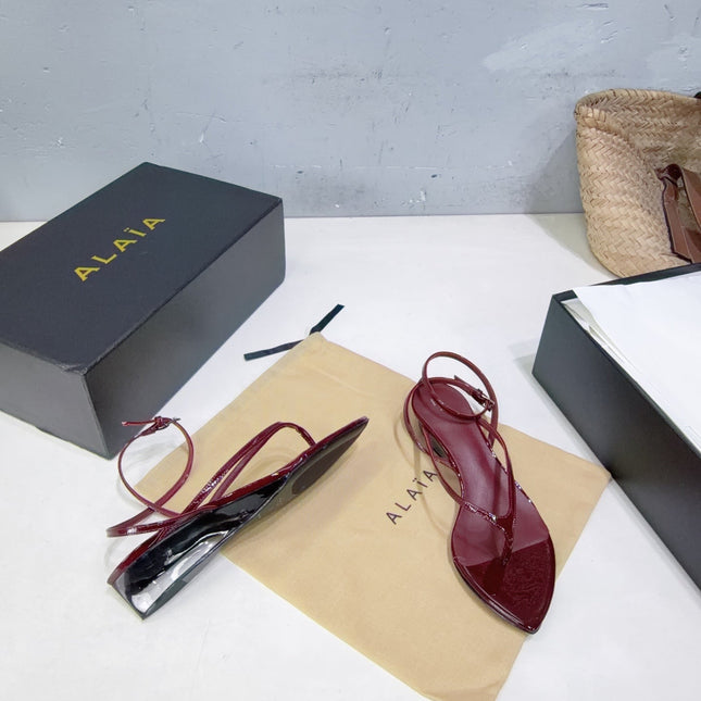 ALAIA 26S THONG SANDALS IN DARK RED CALFSKIN