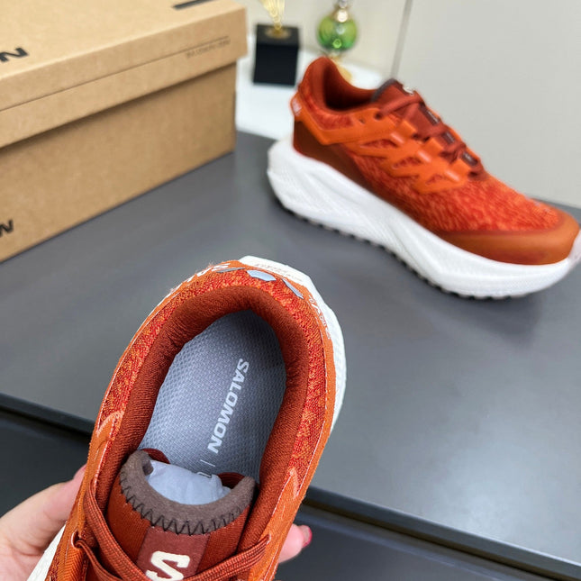 ALO 25S SALOMON ODYSSEY ELMT SNEAKER 45 MM IN DARK ORANGE FABRIC