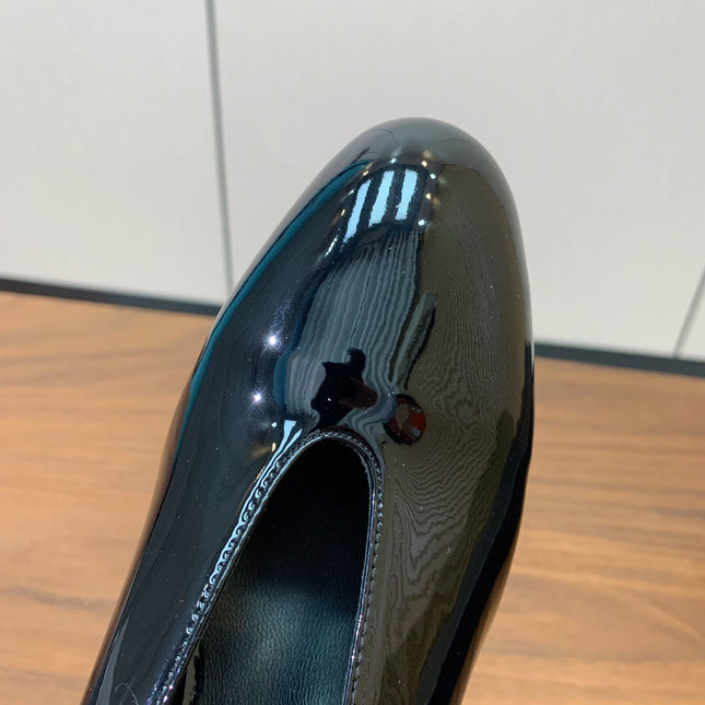 ALAIA 26S WEDGE MULES 70 MM IN BLACK GLOSSY CALFSKIN