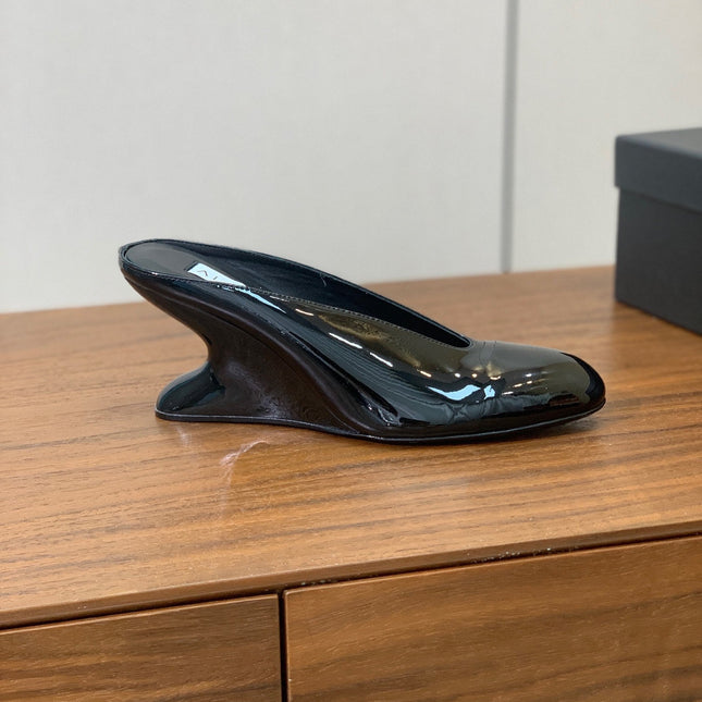 ALAIA 26S WEDGE MULES 70 MM IN BLACK GLOSSY CALFSKIN