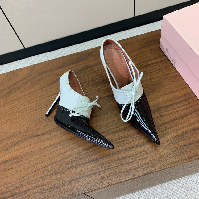 ALAIA 26S LACE-UP HEELED 105 MM IN BLACK AND WHITE GLOSSY CALFSKIN