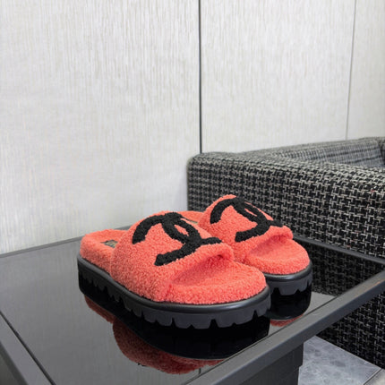 CHANEL 26S SLIDE SANDALS IN BLACK AND CORAL PINK SHEARLING OPEN TOE