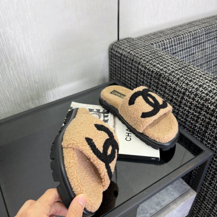 CHANEL 26S SLIDE SANDALS IN BLACK AND BEIGE SHEARLING OPEN TOE