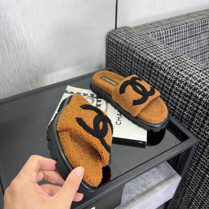 CHANEL 26S SLIDE SANDALS IN BLACK AND CAMEL SHEARLING OPEN TOE