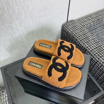 CHANEL 26S SLIDE SANDALS IN BLACK AND CAMEL SHEARLING OPEN TOE