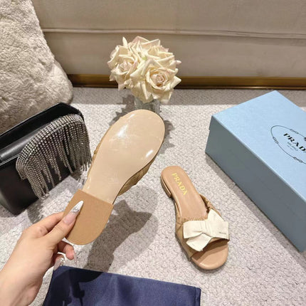 PRADA 26S RUCHED BOW SLIDE SANDALS IN BEIGE CALFSKIN