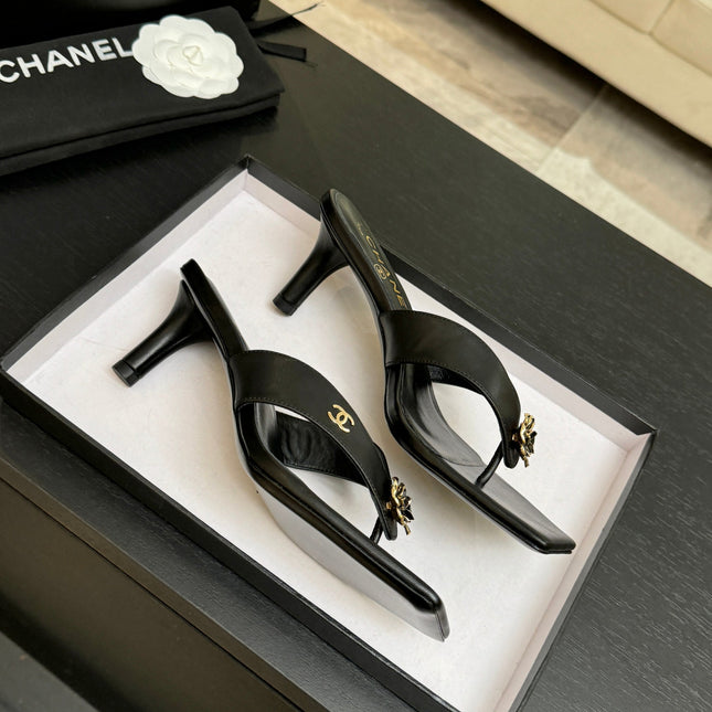 CHANEL 26S CAMELLIA THONG MULE IN BLACK LAMBSKIN