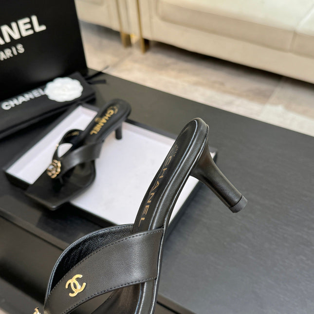 CHANEL 26S CAMELLIA THONG MULE IN BLACK LAMBSKIN
