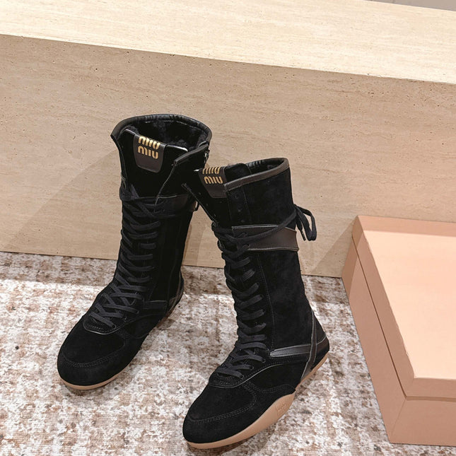MIUMIU 25S ANKLE BOOTS IN BLACK SUEDE WITH SHEARLING