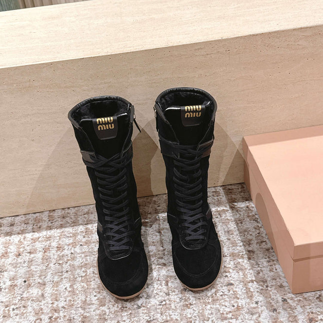 MIUMIU 25S ANKLE BOOTS IN BLACK SUEDE WITH SHEARLING