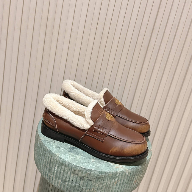 MIUMIU 25S PENNY LOAFERS 20MM IN EBONY BROWN BLEACHED CALFSKIN WITH SHEARLING