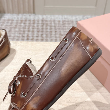 MIUMIU 25S BOAT SHOES IN SIENNA BROWN BLEACHED CALFSKIN WITH SHEARLING