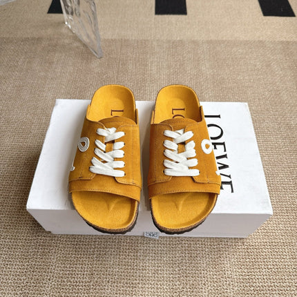 LOEWE 26S LACE-UP FLAT SLIDES IN MUSTARD YELLOW SUEDE