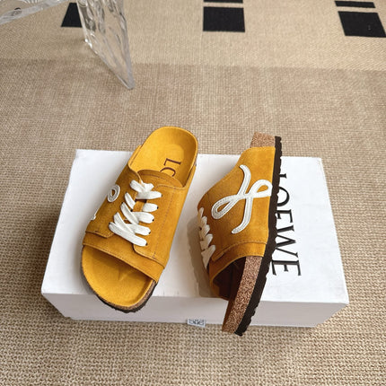 LOEWE 26S LACE-UP FLAT SLIDES IN MUSTARD YELLOW SUEDE