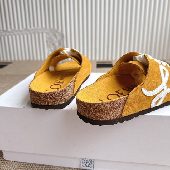 LOEWE 26S LACE-UP FLAT SLIDES IN MUSTARD YELLOW SUEDE