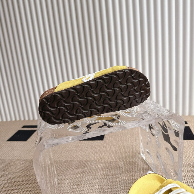 LOEWE 26S LACE-UP FLAT SLIDES IN YELLOW SUEDE