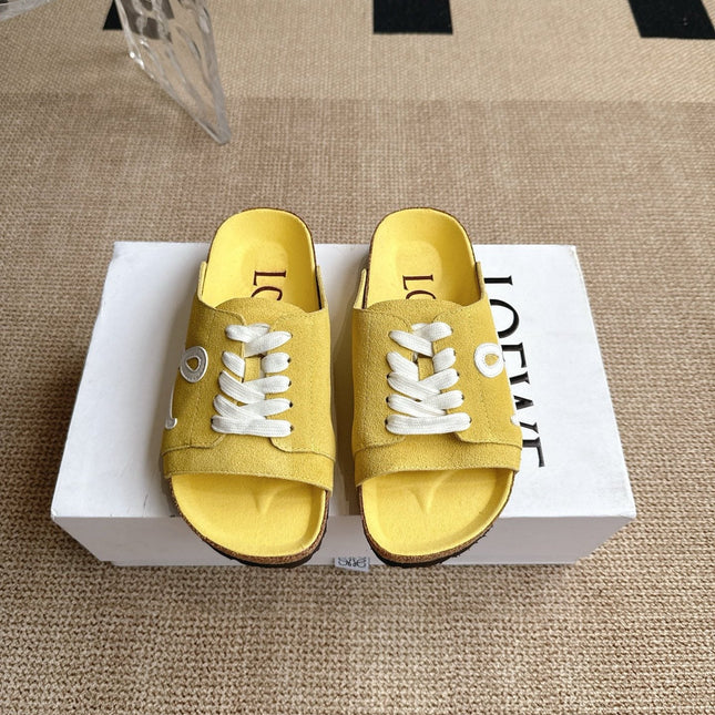LOEWE 26S LACE-UP FLAT SLIDES IN YELLOW SUEDE