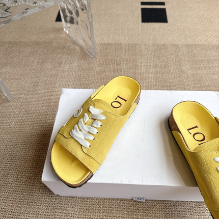 LOEWE 26S LACE-UP FLAT SLIDES IN YELLOW SUEDE