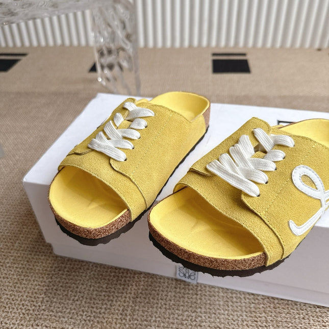 LOEWE 26S LACE-UP FLAT SLIDES IN YELLOW SUEDE