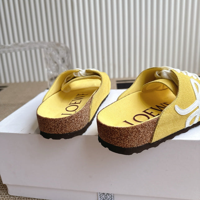 LOEWE 26S LACE-UP FLAT SLIDES IN YELLOW SUEDE