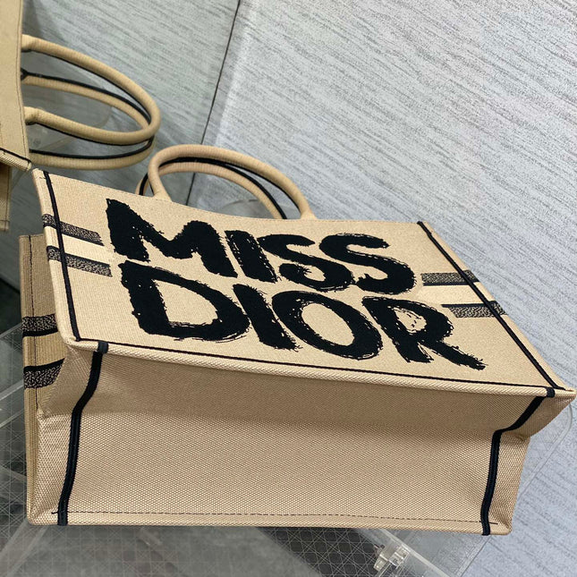LARGE BOOK TOTE 42 BEIGE AND BLACK MISS DIOR GRAFFITI EMBROIDERY