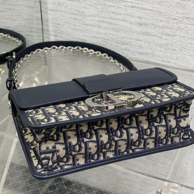 MONTAIGNE EAST-WEST 25 BAG WITH CHAIN IN NAVY BLUE LAMBSKIN AND MONOGRAM JACQUARD