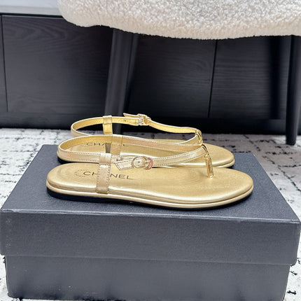 CHANEL 26S THONG SANDALS IN GOLD CALFSKIN WITH GOLD HARDWARE