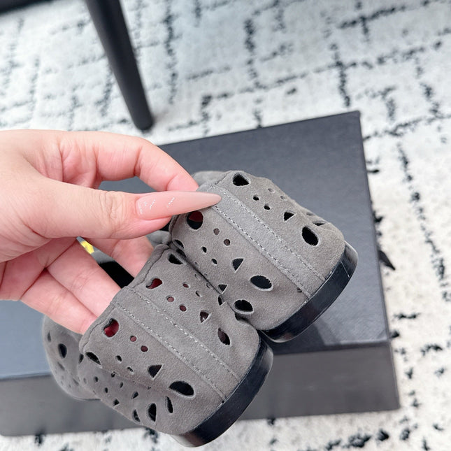 ALAIA 26S FLAT SLIP-ONS IN GREY SUEDE WITH OPENWORK PATTERN