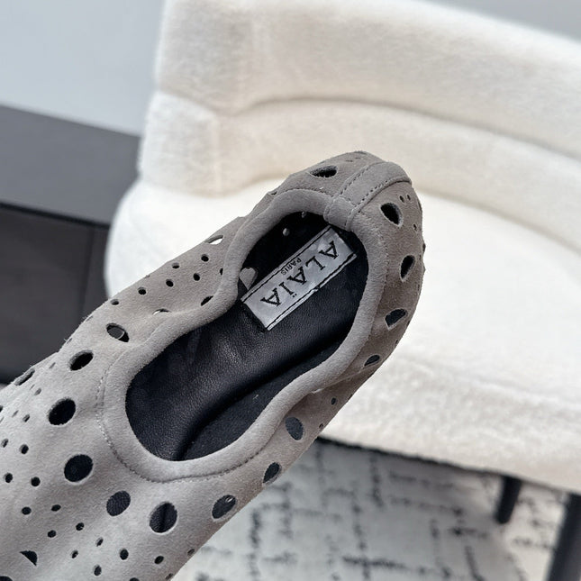 ALAIA 26S FLAT SLIP-ONS IN GREY SUEDE WITH OPENWORK PATTERN