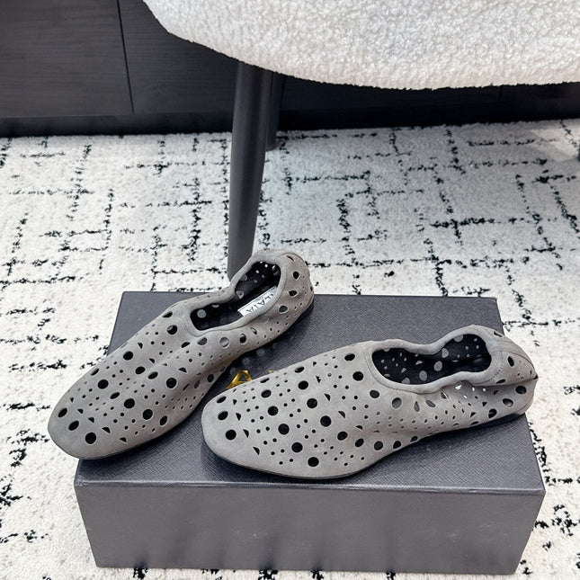 ALAIA 26S FLAT SLIP-ONS IN GREY SUEDE WITH OPENWORK PATTERN
