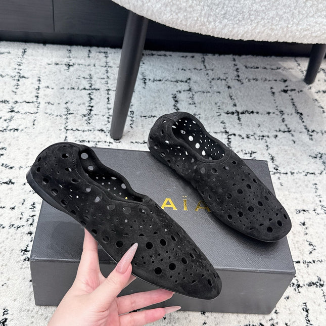 ALAIA 26S FLAT SLIP-ONS IN BLACK SUEDE WITH OPENWORK PATTERN