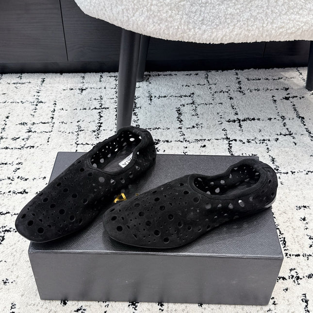 ALAIA 26S FLAT SLIP-ONS IN BLACK SUEDE WITH OPENWORK PATTERN