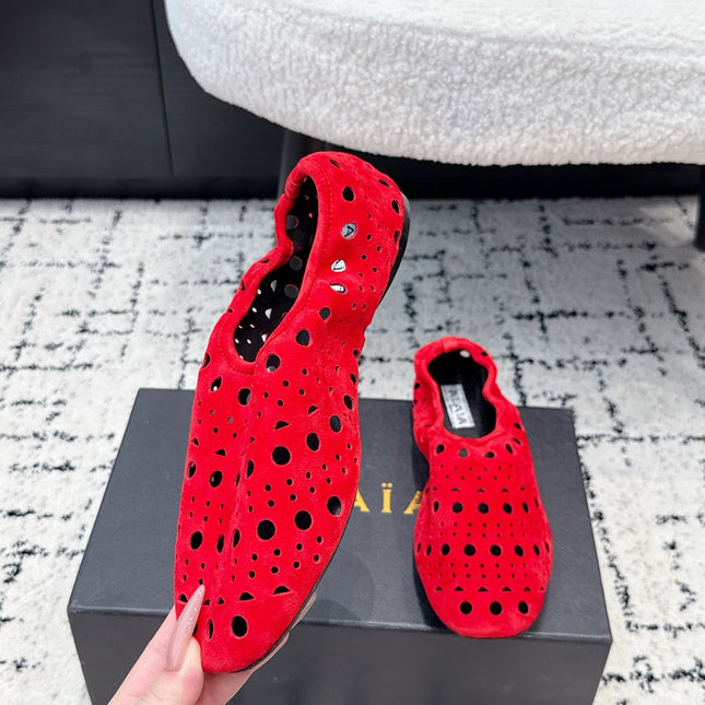 ALAIA 26S FLAT SLIP-ONS IN RED SUEDE WITH OPENWORK PATTERN