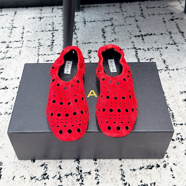ALAIA 26S FLAT SLIP-ONS IN RED SUEDE WITH OPENWORK PATTERN