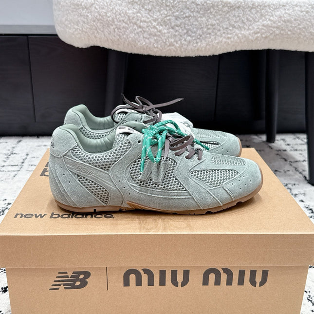 MIUMIU 26S SNEAKERS IN LIGHT BLUE SUEDE SUEDE AND MESH FABRIC