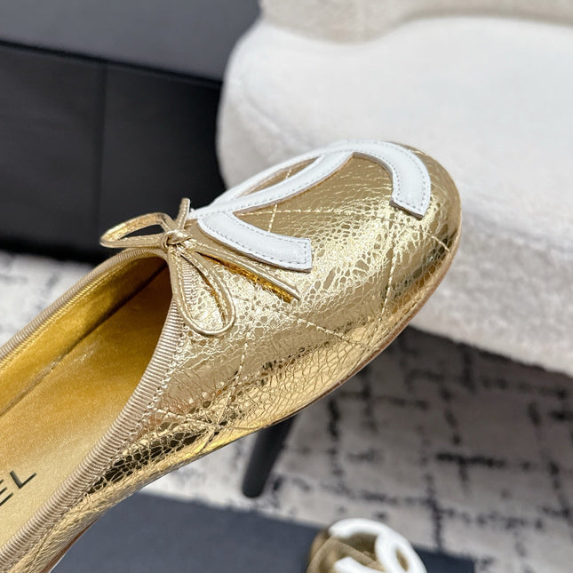 CHANEL 26S FLAT MULES IN GOLD LAMBSKIN