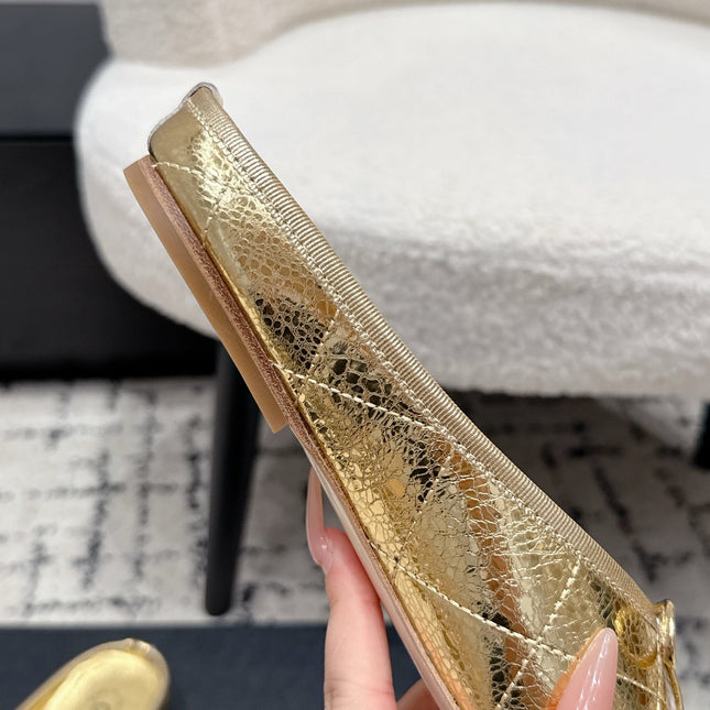 CHANEL 26S FLAT MULES IN GOLD LAMBSKIN