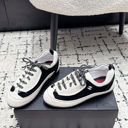 CHANEL 26S LACE-UP SNEAKERS IN WHITE AND BLACK SUEDE STYLE 2