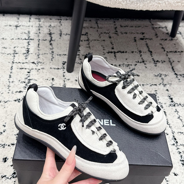 CHANEL 26S LACE-UP SNEAKERS IN WHITE AND BLACK SUEDE STYLE 2