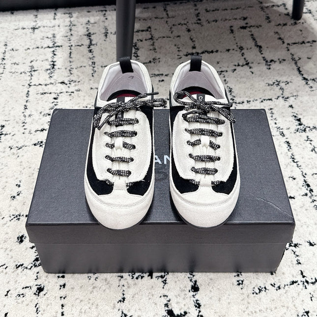 CHANEL 26S LACE-UP SNEAKERS IN WHITE AND BLACK SUEDE STYLE 2